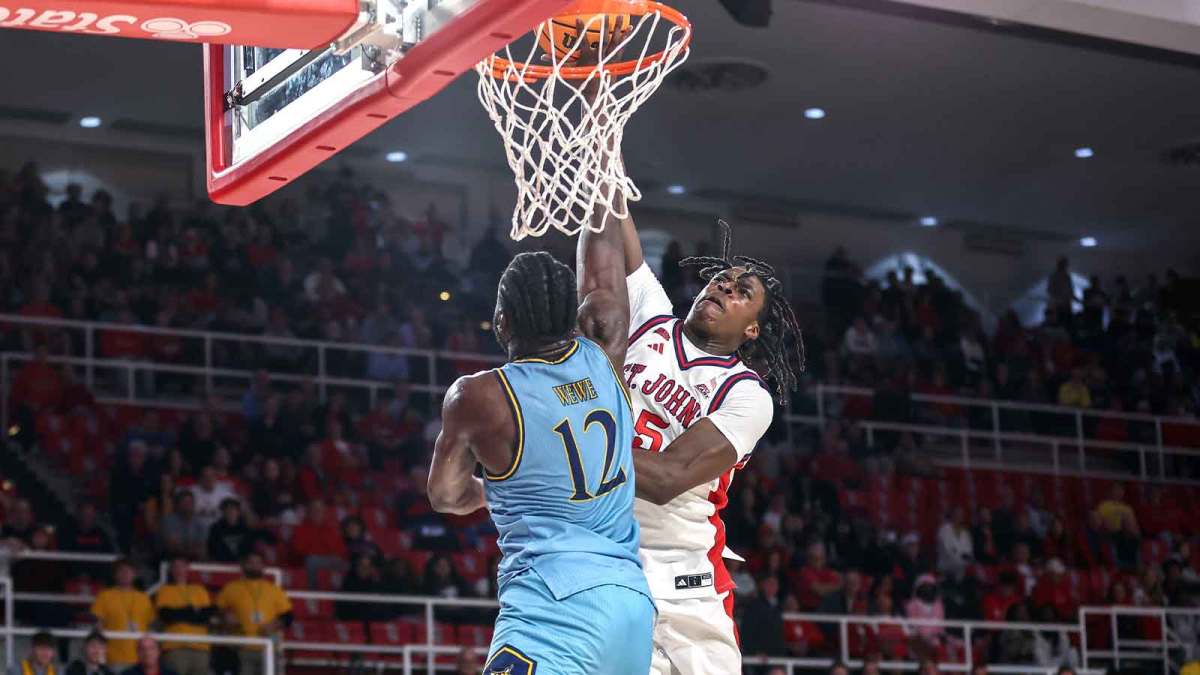 St. John's Red Storm guard Kelvin Odih (5) attempts to dunk on Quinnipiac Bobcats forward Spence Wewe (12) in the second half at Carnesecca Arena.