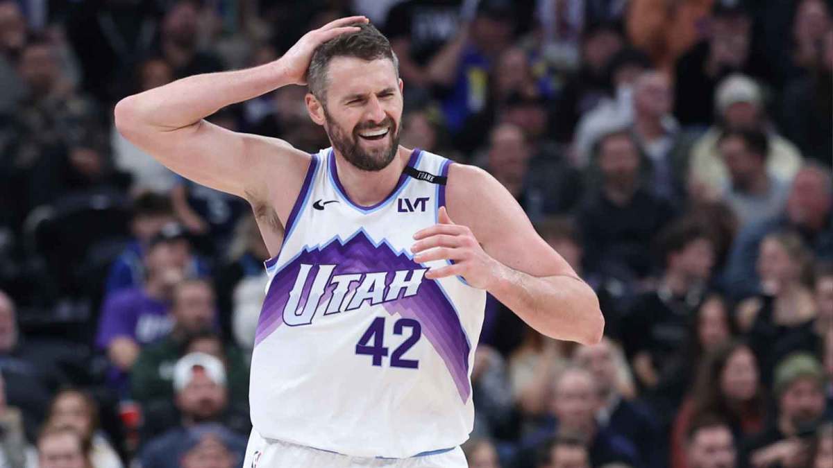 Utah Jazz forward Kevin Love (42) reacts to a three-point shot against the Minnesota Timberwolves during the second half at Delta Center.