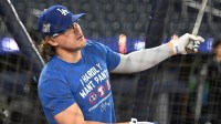 Los Angeles Dodgers first baseman Kike Hernandez (8) takes batting practice during World Series team workouts at Rogers Centre.