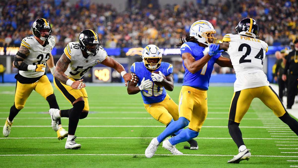 Los Angeles Chargers running back Kimani Vidal (30) carries the ball against the Pittsburgh Steelers during the fourth quarter of the game at SoFi Stadium.
