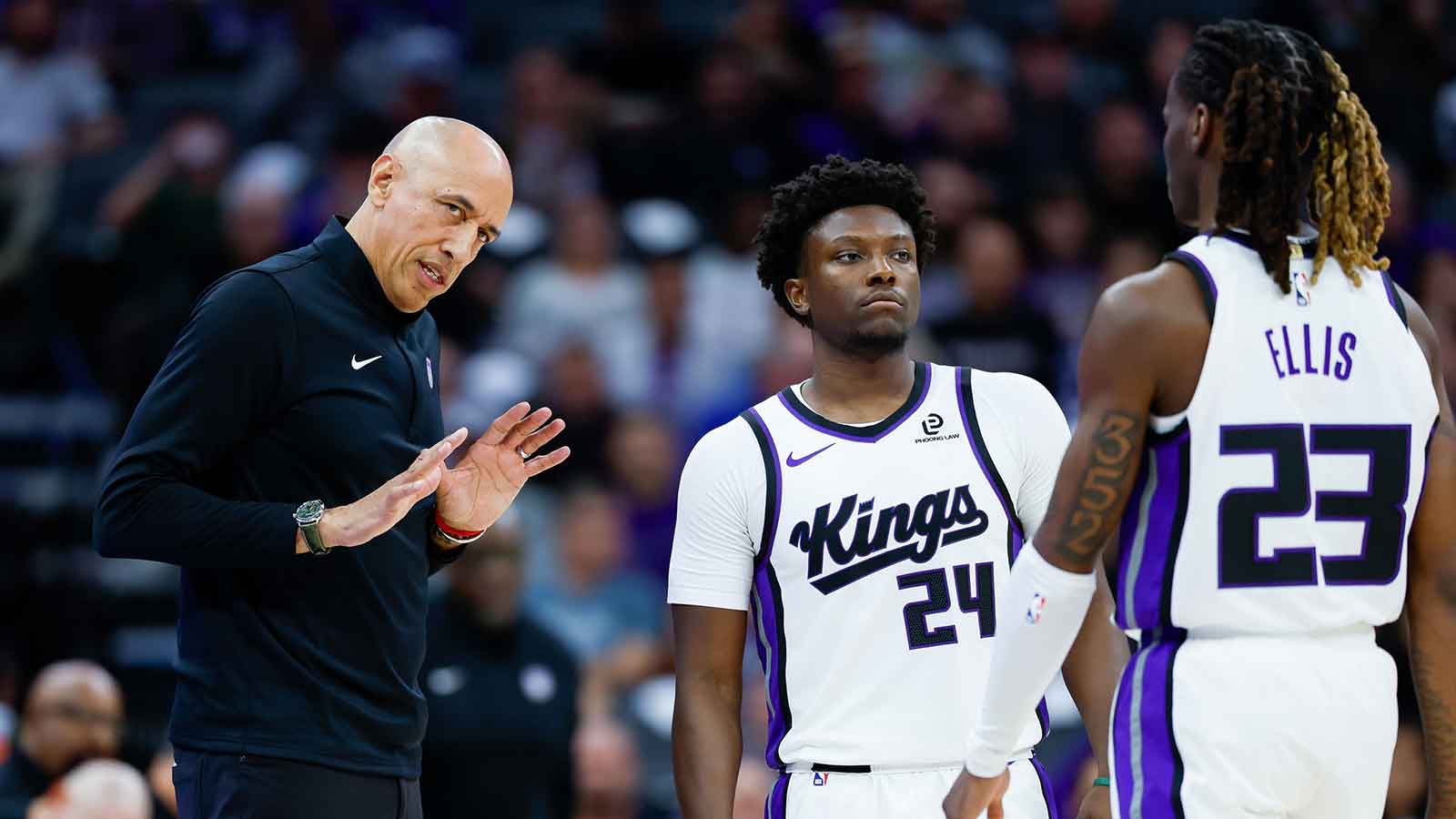 Sacramento Kings Head Coach Doug Christie instructs guard Isaiah Stevens (24) and Keon Ellis (23) during the second quarter against the Los Angeles Clippers at Golden 1 Center.