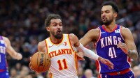 Atlanta Hawks guard Trae Young (11) drives to the basket against Sacramento Kings forward Trey Lyles (41) during the second quarter at Golden 1 Center.