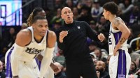 Sacramento Kings head coach Doug Christie calls a play in the 4th quarter against the Milwaukee Bucks at Fiserv Forum.