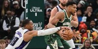 Sacramento Kings guard Russell Westbrook (18) vies for the ball against Milwaukee Bucks forward Giannis Antetokounmpo (34) in the fourth quarter at Fiserv Forum.
