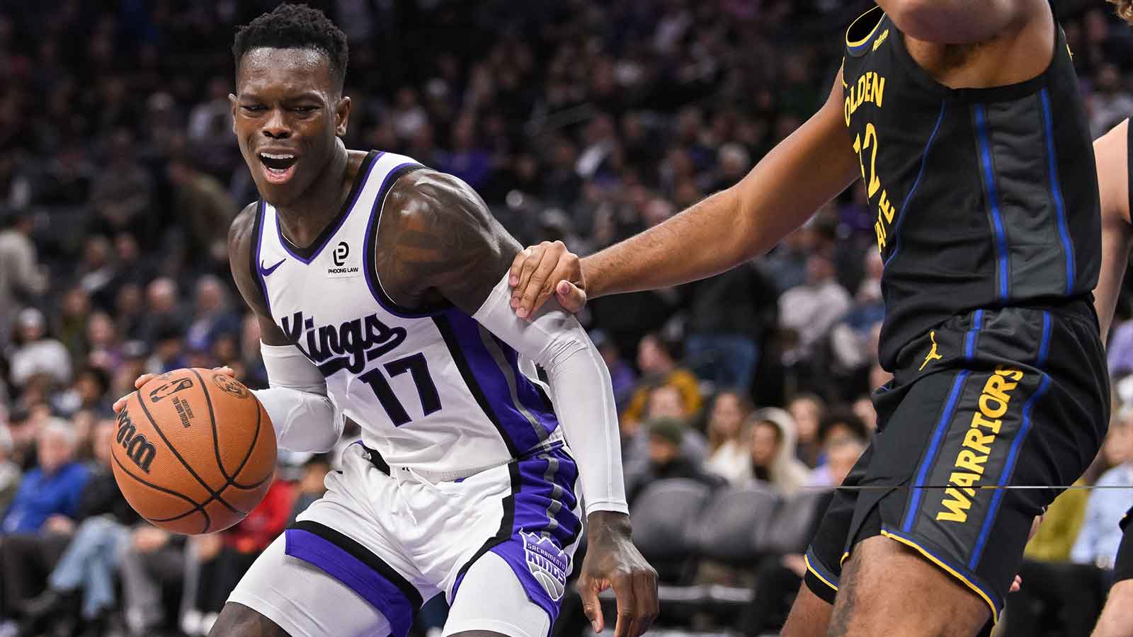 Imagn: Kings guard Dennis Schroder (17) drives to the basket