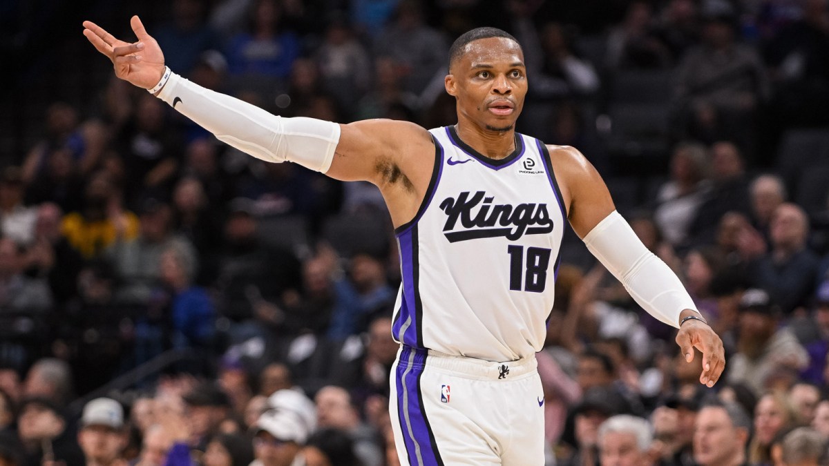 Kings guard Russell Westbrook (18) celebrates after scoring against the Golden State Warriors during the second quarter at Golden 1 Center with Thunder's Cason Wallace in the background