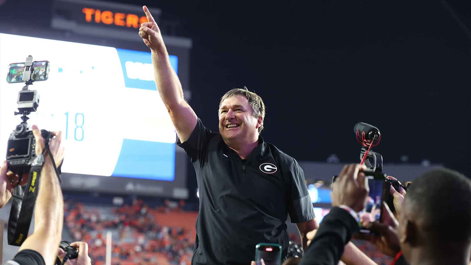 Georgia Bulldogs head coach Kirby Smart celebrates after the Bulldogs beat the Auburn Tigers at Jordan-Hare Stadium.