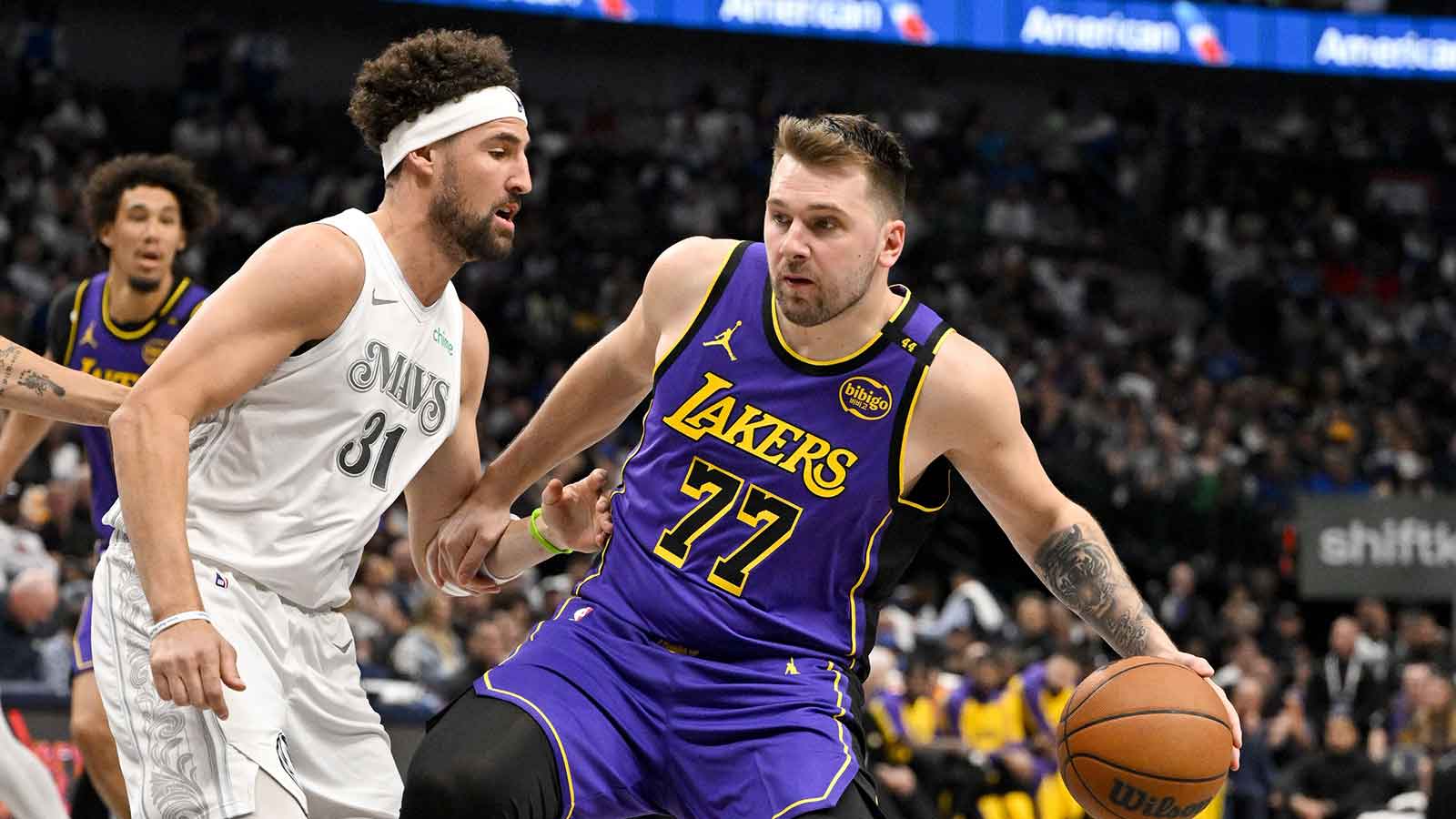 Dallas Mavericks guard Klay Thompson (31) and Los Angeles Lakers guard Luka Doncic (77) in action during the game between the Dallas Mavericks and the Los Angeles Lakers at American Airlines Center.