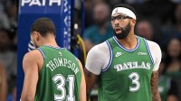 Dallas Mavericks guard Klay Thompson (31) and forward Anthony Davis (3) look on during the game between the Mavericks and the Raptors at the American Airlines Center.
