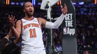 Knicks guard Jalen Brunson (11) reacts after getting called