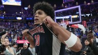 Arizona Wildcats forward Koa Peat (10) celebrates defeating the Florida Gators in the Hall of Fame Series game at T-Mobile Arena.