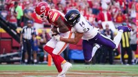 Kansas City Chiefs wide receiver Tyquan Thornton (80) scores a touchdown as Baltimore Ravens safety Kyle Hamilton (14) defends during the third quarter at GEHA Field at Arrowhead Stadium.