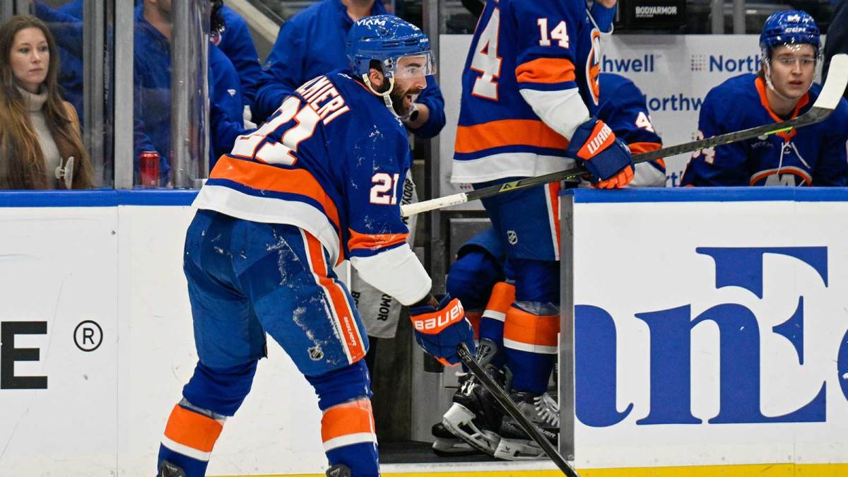 New York Islanders center Kyle Palmieri (21) makes a pass after being injured against the Philadelphia Flyers during the second period at UBS Arena.