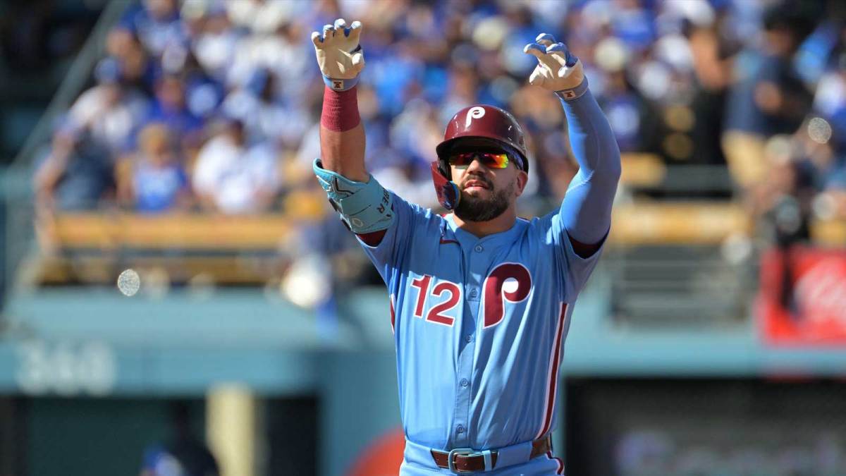Philadelphia Phillies left fielder Kyle Schwarber (12) reacts after a double in the first inning against the Los Angeles Dodgers during game four of the NLDS round for the 2025 MLB playoffs at Dodger Stadium.