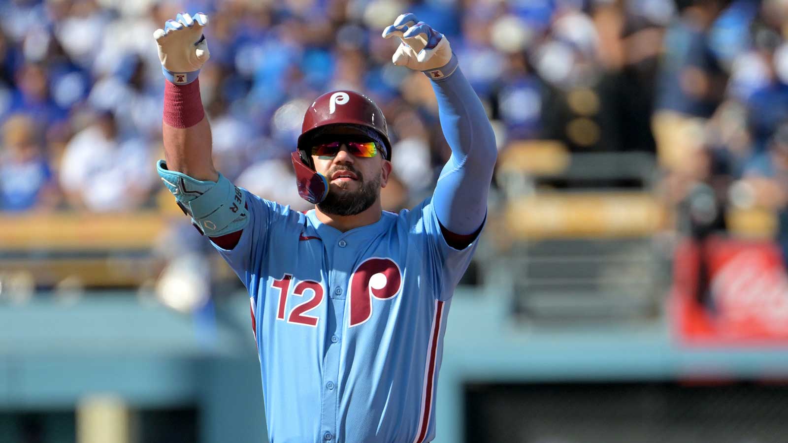 Philadelphia Phillies left fielder Kyle Schwarber (12) reacts after a double in the first inning against the Los Angeles Dodgers during game four of the NLDS round for the 2025 MLB playoffs at Dodger Stadium
