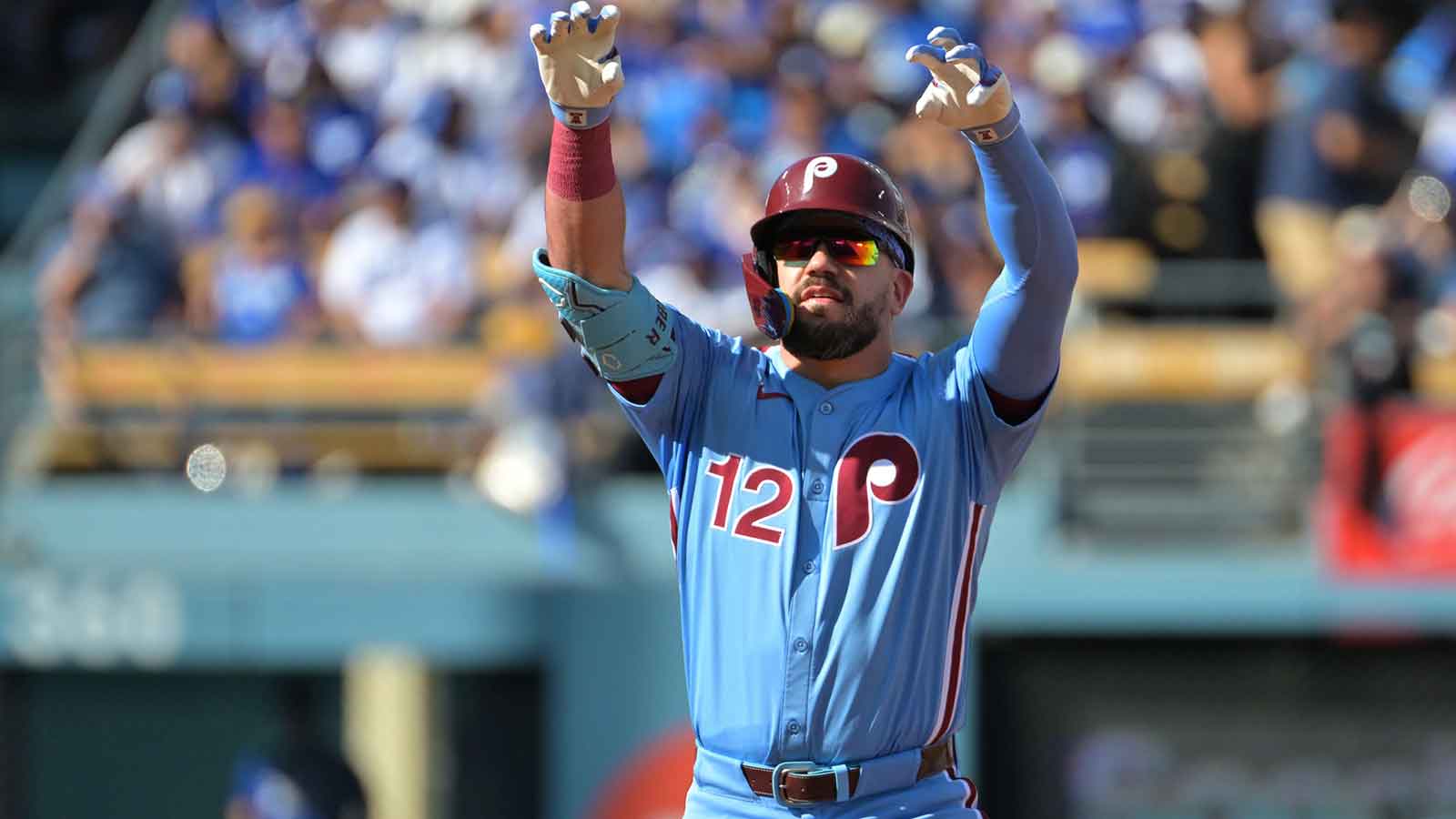 Philadelphia Phillies left fielder Kyle Schwarber (12) reacts after a double in the first inning against the Los Angeles Dodgers during game four of the NLDS round for the 2025 MLB playoffs at Dodger Stadium.