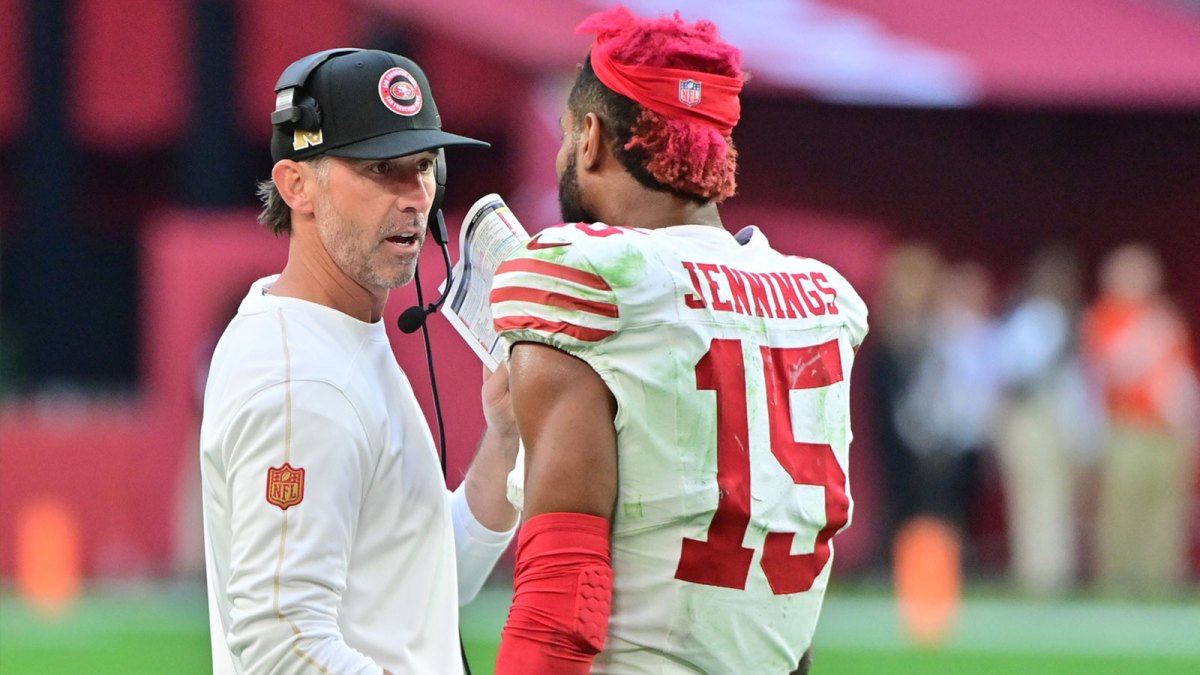 San Francisco 49ers wide receiver Jauan Jennings (15) talks with head coach Kyle Shanahan after being ejected in the first half against the Arizona Cardinals at State Farm Stadium.