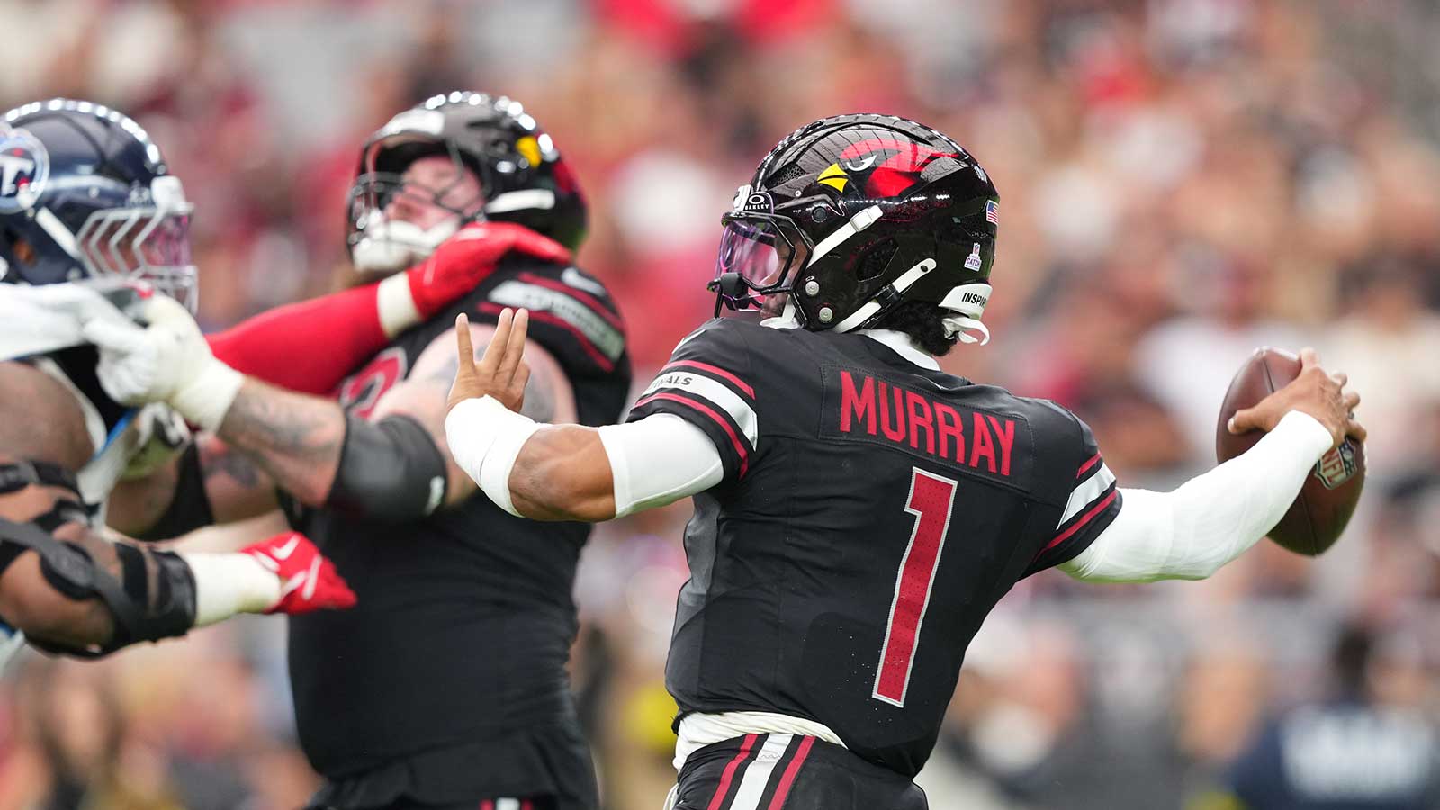Arizona Cardinals quarterback Kyler Murray (1) makes a throw during the third quarter against the Tennessee Titans at State Farm Stadium.