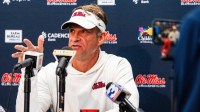 Ole Miss head coach Lane Kiffin answers questions from the press after a college football game between Mississippi State and Ole Miss at Davis Wade Stadium in Starkville, Miss., on Friday, Nov. 28, 2025. Ole Miss defeated Mississippi State 38-19 in the Egg Bowl.