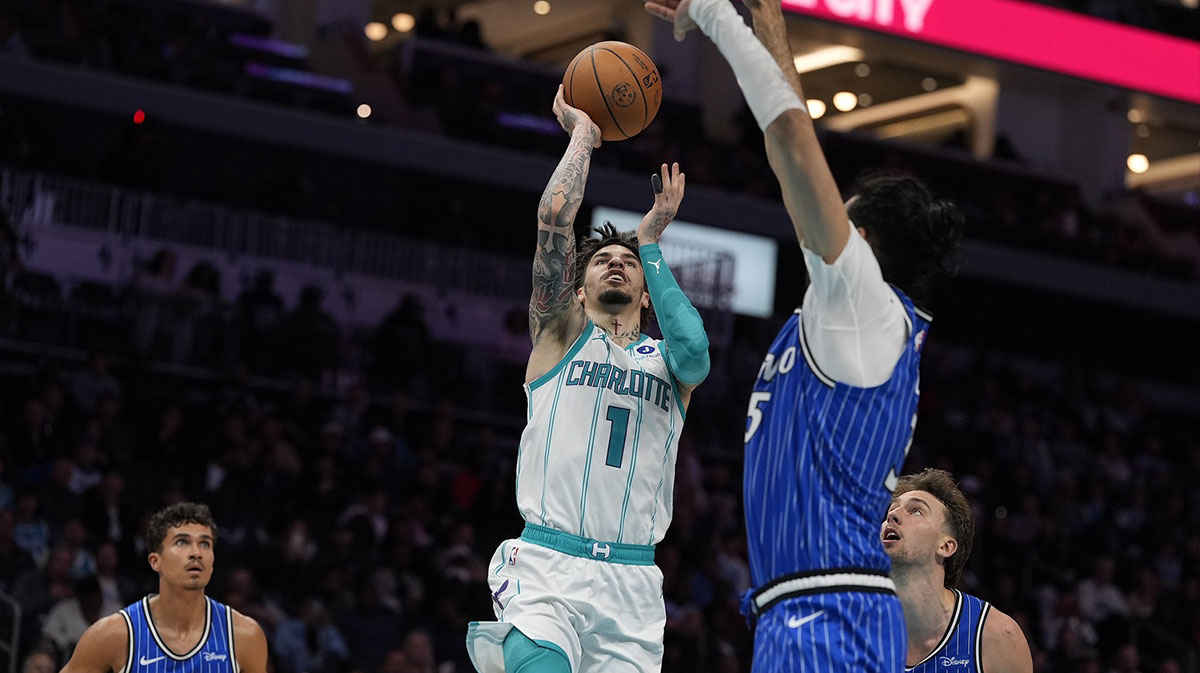 Charlotte Hornets guard LaMelo Ball (1) drives to the basket against Orlando Magic center Goga Bitadze (35) during the second half at Spectrum Center.