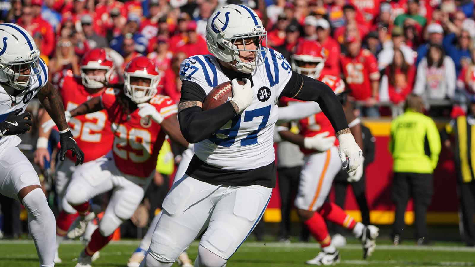  Indianapolis Colts defensive end Laiatu Latu (97) runs after an interception against the Kansas City Chiefs in the first quarter at GEHA Field at Arrowhead Stadium.