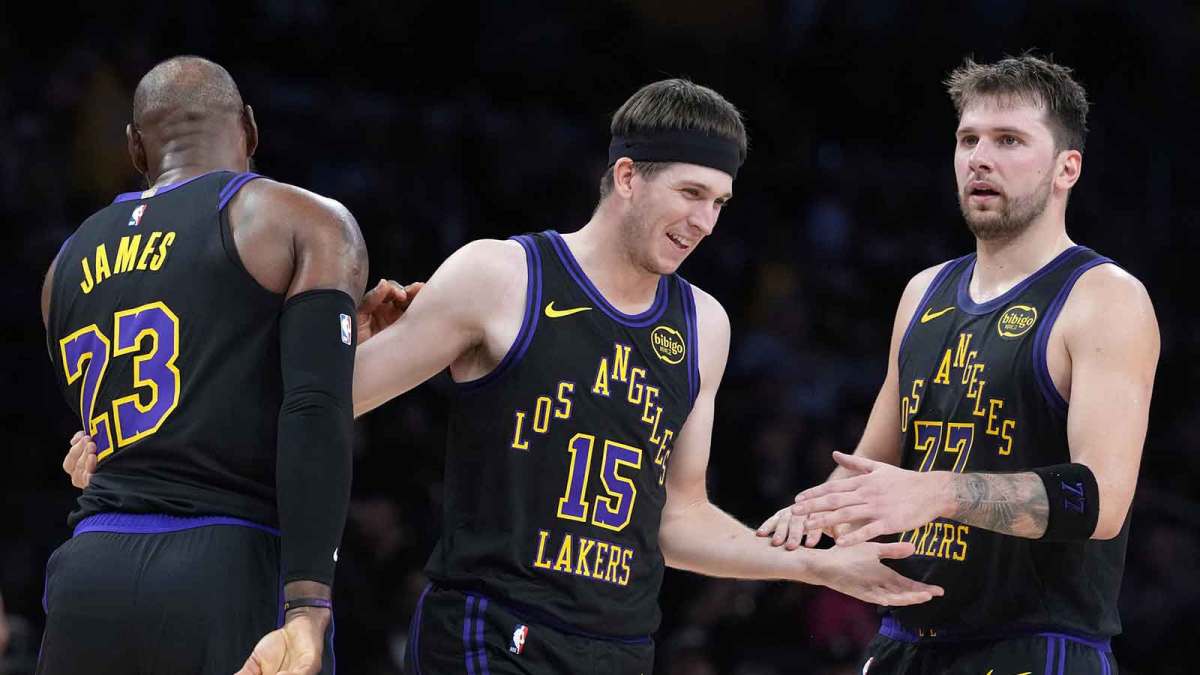 Lakers' Austin Reaves, LeBron James, and Luka Doncic smiling