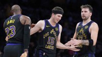 Lakers' Austin Reaves, LeBron James, and Luka Doncic smiling