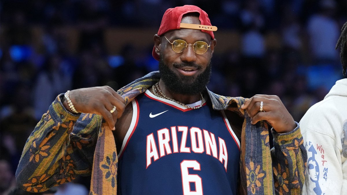 Los Angeles Lakers forward LeBron James poses in the Arizona Wildcats jersey of his son Bryce James (6) during the game against the Minnesota Timberwolves at Crypto.com Arena.