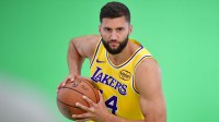Lakers center Maxi Kleber (14) during media day at UCLA Health Training Center with the Hawks logo in the background