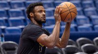 Los Angeles Lakers guard Bronny James (9) warms up before the game against the New Orleans Pelicans at Smoothie King Center.