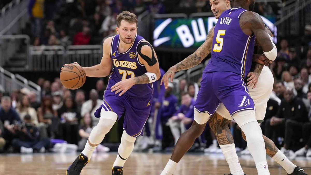 Los Angeles Lakers guard Luka Doncic (77) drives towards the basket during the fourth quarter at Fiserv Forum. Mandatory Credit: Jeff Hanisch-Imagn Images