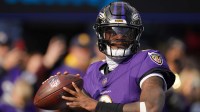 Baltimore Ravens quarterback Lamar Jackson (8) warms up before the game against the New York Jets at M&T Bank Stadium.