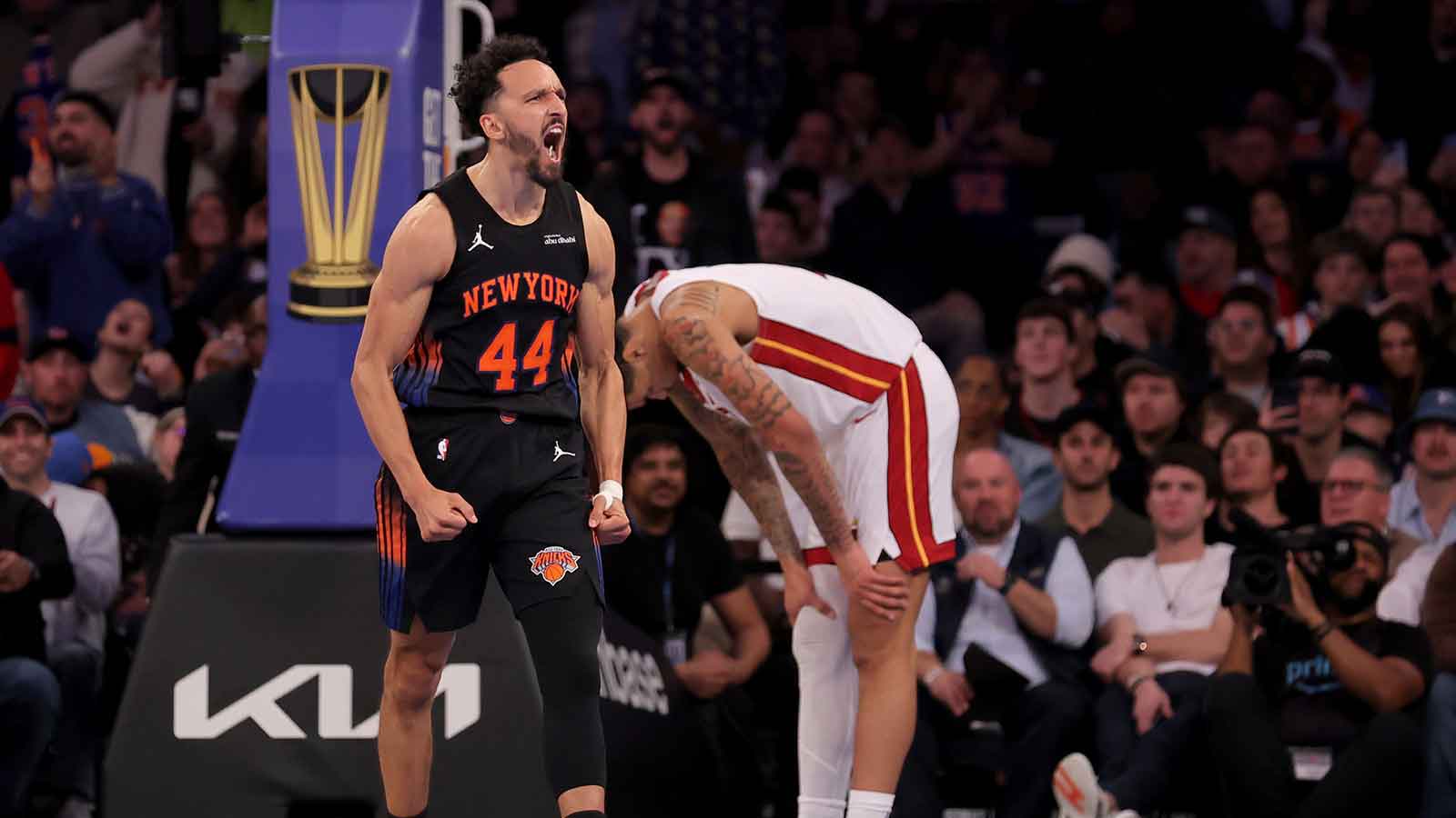 New York Knicks guard Landry Shamet (44) reacts in front of Miami Heat center Kel'el Ware (7) during the fourth quarter at Madison Square Garden.