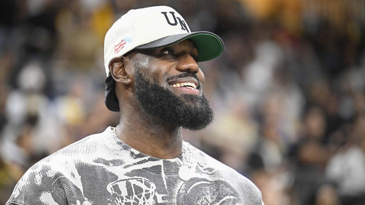 Los Angeles Lakers player LeBron James looks on during the first half of a game between the Phoenix Suns and the Los Angeles Lakers at Acrisure Arena.
