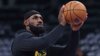 Los Angeles Lakers forward LeBron James (23) warms up before the game against the Utah Jazz at Delta Center.