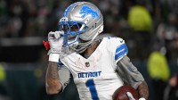 Detroit Lions wide receiver Jameson Williams (1) reacts after scoring a touchdown against the Philadelphia Eagles during the first half at Lincoln Financial Field.