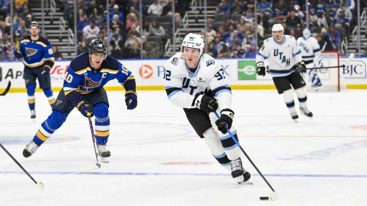 Utah Mammoth center Logan Cooley (92) controls the puck against the St. Louis Blues during the first period at Enterprise Center.