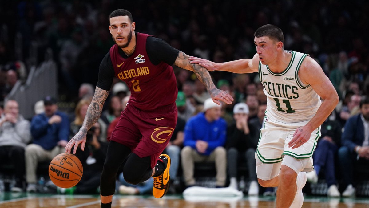 Cleveland Cavaliers guard Lonzo Ball (2) returns the ball against Boston Celtics guard Payton Pritchard (11) in the second half at TD Garden.