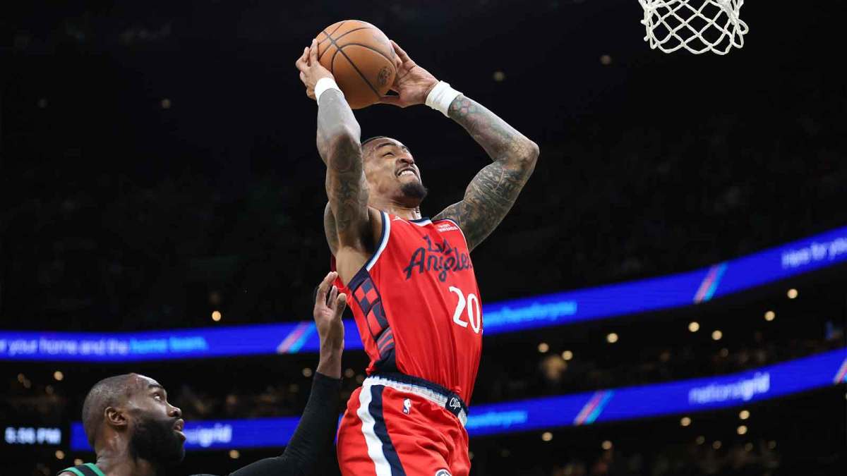 Los Angeles Clippers center John Collins (20) shoots during the second half against the Boston Celtics at TD Garden.