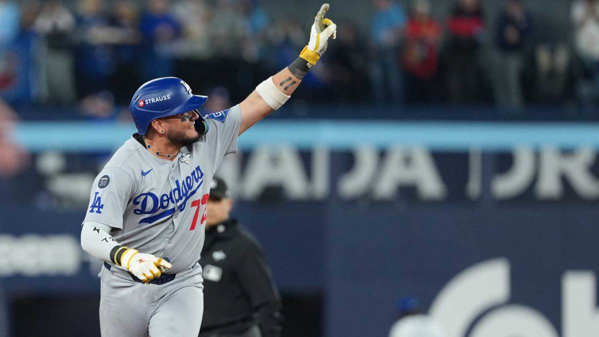 Los Angeles Dodgers second baseman Miguel Rojas (72) reacts after hitting a home run against the Toronto Blue Jays in the ninth inning for game seven of the 2025 MLB World Series at Rogers Centre.