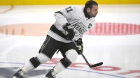 Los Angeles Kings forward Anze Kopitar (11) warms up before playing the Toronto Maple Leafs at Scotiabank Arena.