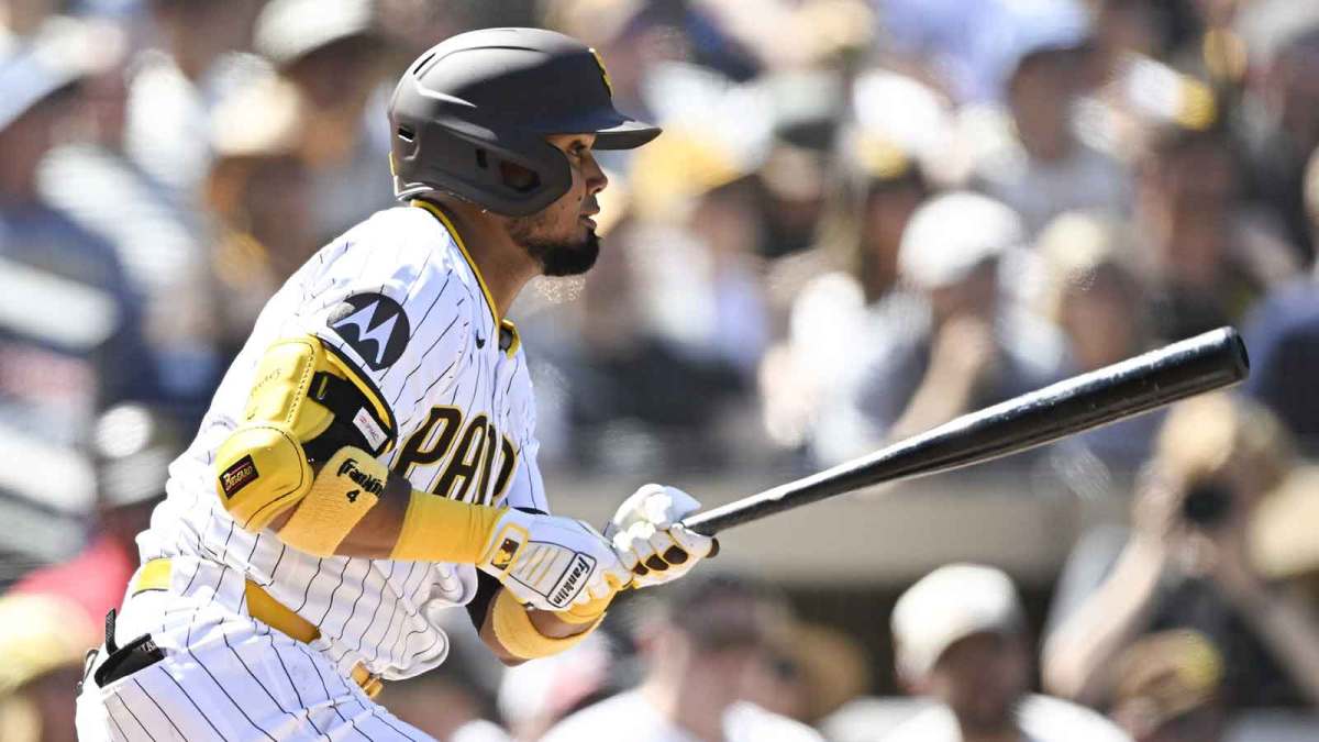 San Diego Padres first baseman Luis Arraez (4) hits a single during the first inning against the Milwaukee Brewers at Petco Park.