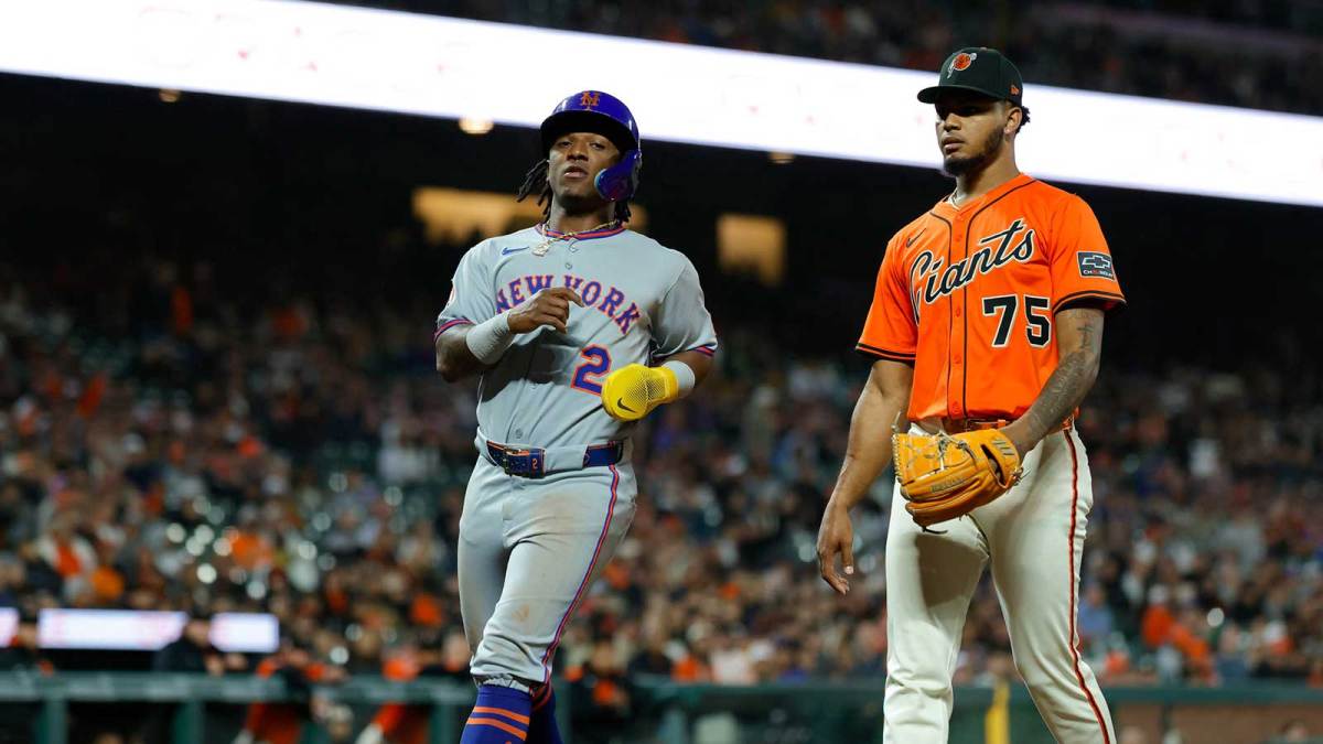 New York Mets second baseman Luisangel Acuna (2) scores a run on a wild pitch by San Francisco Giants pitcher Camilo Doval (75) during the ninth inning at Oracle Park.