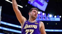os Angeles Lakers guard Luka Doncic (77) reacts after scoring the basket and drawing the foul against the San Antonio Spurs during the first half at Crypto.com Arena.