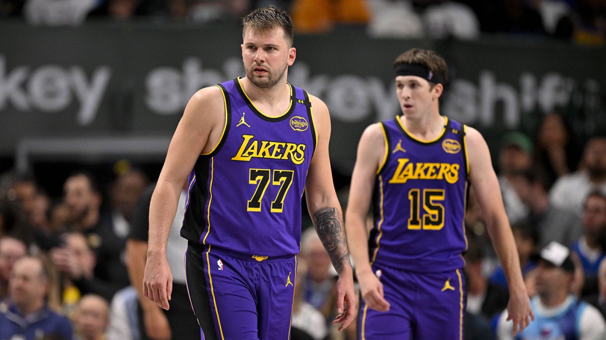 Los Angeles Lakers guard Luka Doncic (77) and guard Austin Reaves (15) during the game between the Dallas Mavericks and the Los Angeles Lakers at American Airlines Center.