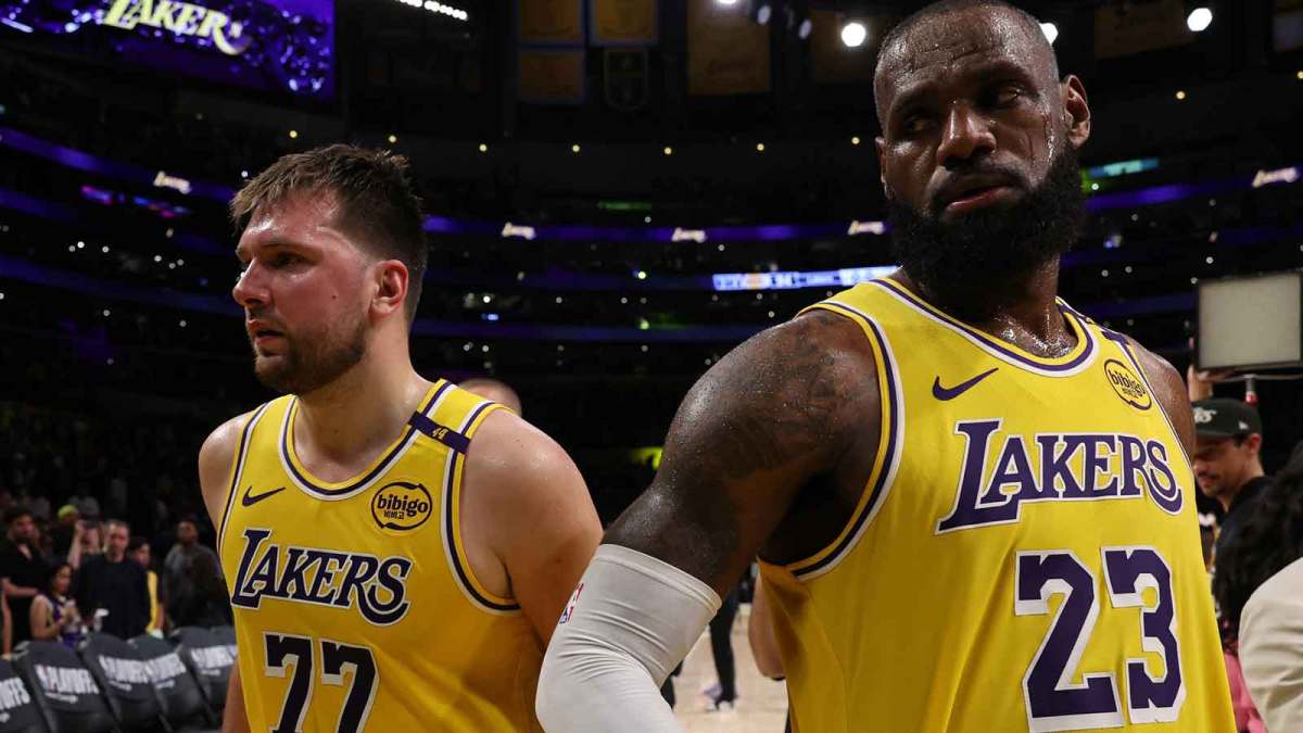 Los Angeles Lakers guard Luka Doncic (77) and Los Angeles Lakers forward LeBron James (23) leave a court after defeating the Minnesota Timberwolves 94-85 in game two of first round for the 2024 NBA Playoffs at Crypto.com Arena.