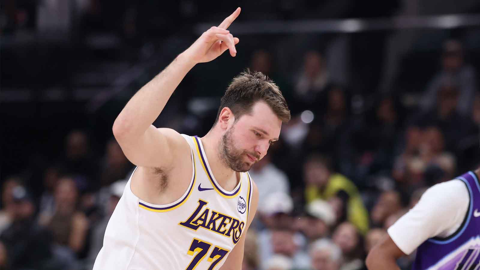 Los Angeles Lakers guard Luka Doncic (77) reacts to a shot against the Utah Jazz during the second half at Delta Center.