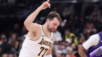 Los Angeles Lakers guard Luka Doncic (77) reacts to a shot against the Utah Jazz during the second half at Delta Center. Mandatory Credit: Rob Gray-Imagn Images