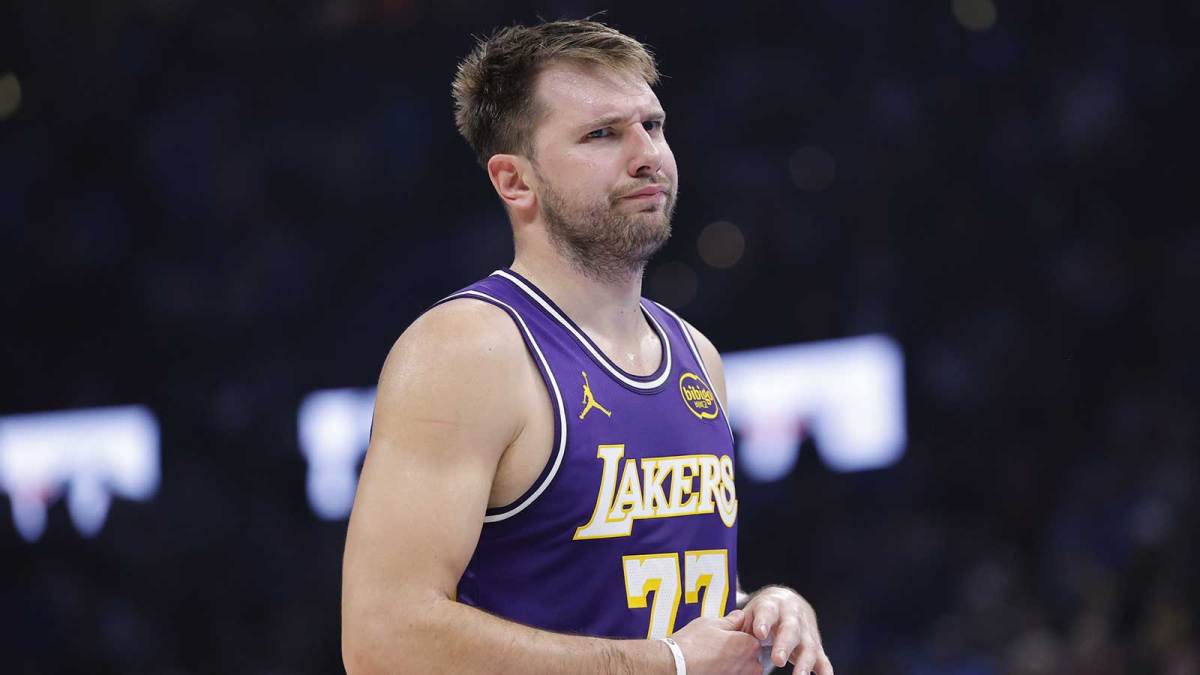 Los Angeles Lakers guard Luka Doncic reacts to a fan during the second quarter of a game against the Oklahoma City Thunder at Paycom Center.