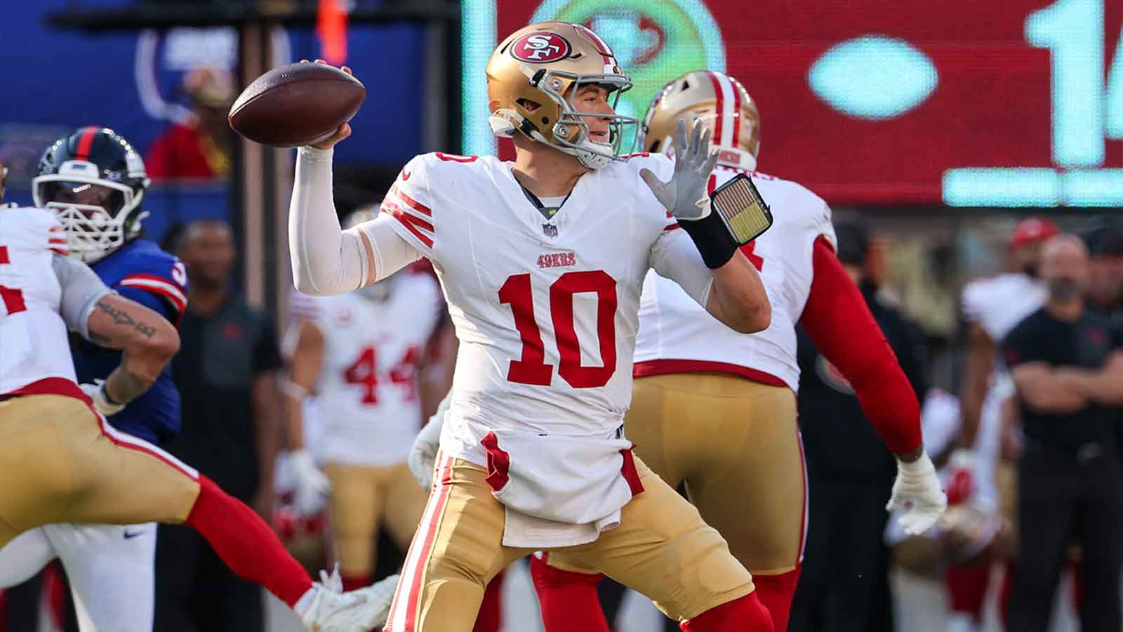 San Francisco 49ers quarterback Mac Jones (10) stands in the pocket against the New York Giants during the first half at MetLife Stadium.